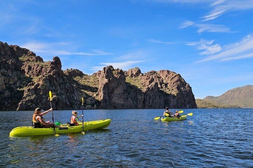 Mom and daughters paddle with Teri on a guided tour