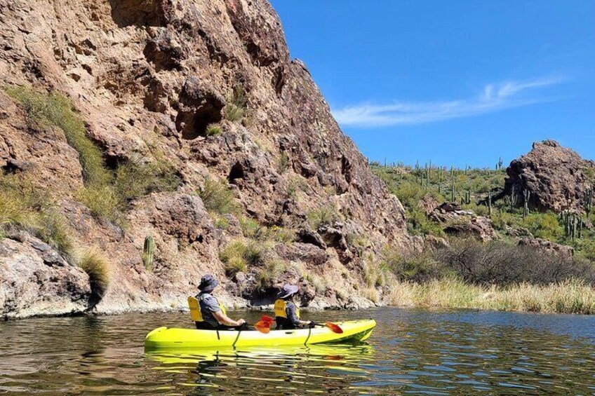 Tandem Kayakers paddling on a guided tour by Teri