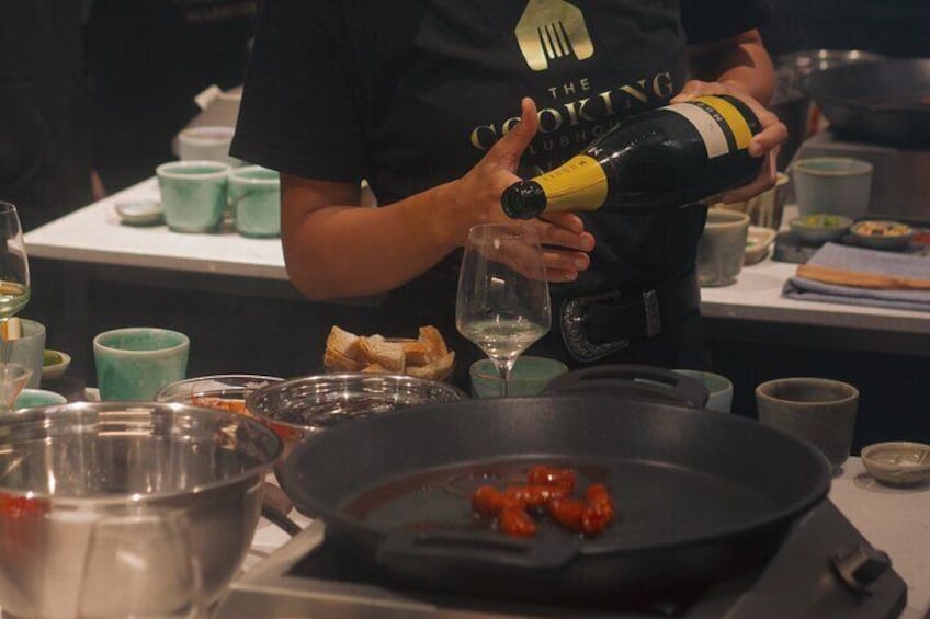 Paella cooking Class in Madrid with Bottomless Wine Pairing!