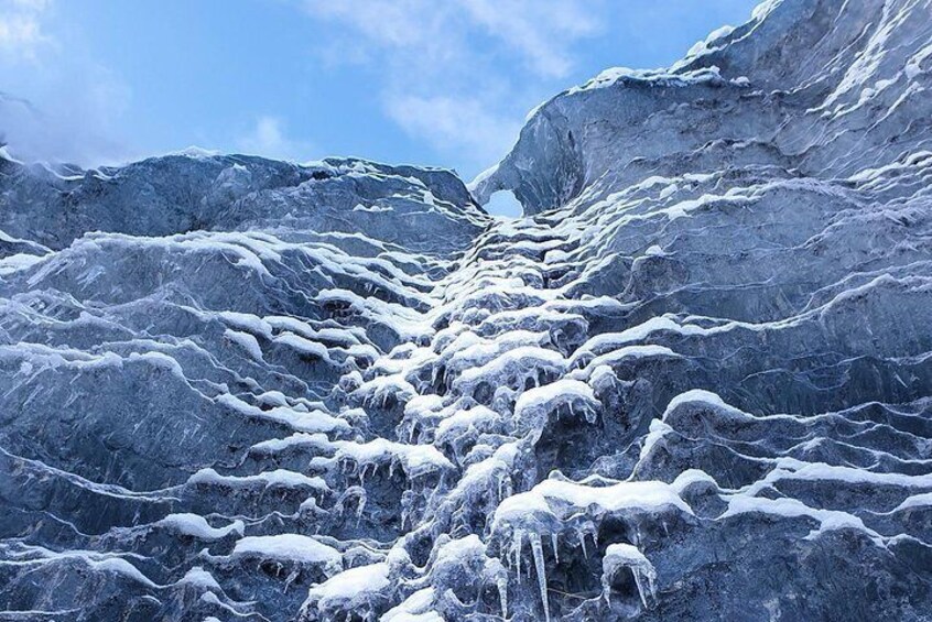 Ice Cave and Glacier walk into blue glacier canyon 