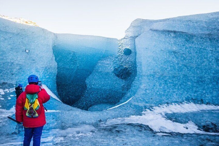 Ice Cave and Glacier walk into blue glacier canyon 