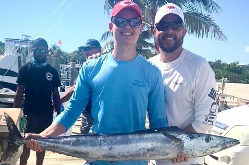 Happy Guests with Catching Wahoo.