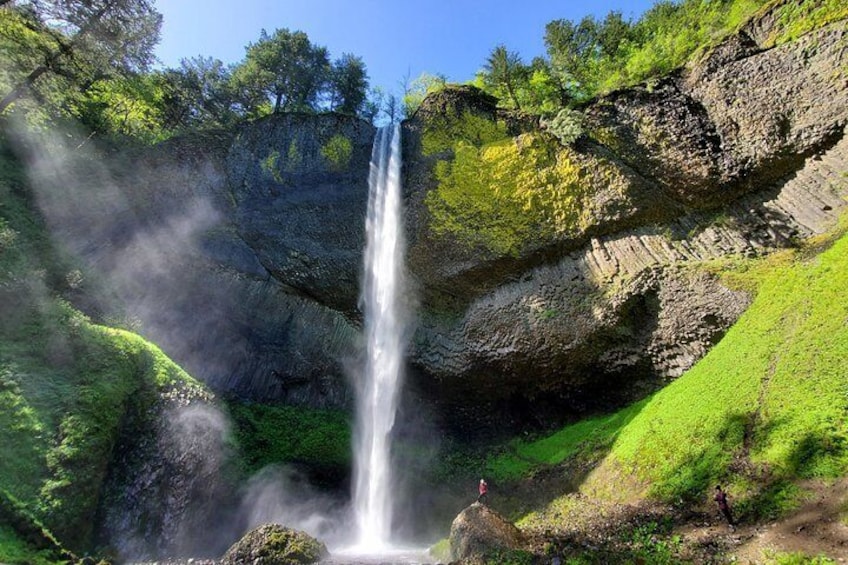 An inspired guest soaking in the mist of magnificent Latourell Falls!