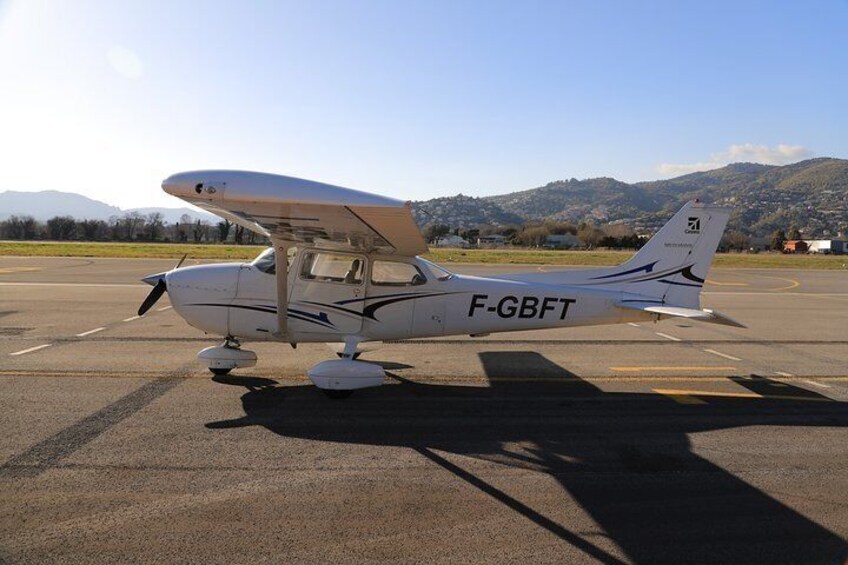 Fly above Normandy's hallowed coastline in a private plane