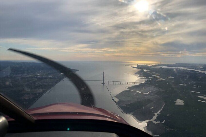 Fly above Normandy's hallowed coastline in a private plane
