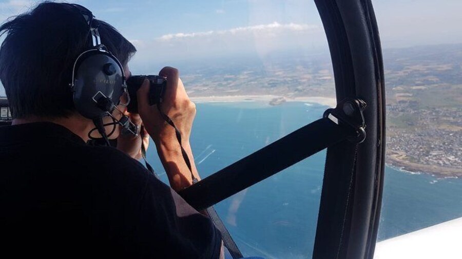 Fly above Normandy's hallowed coastline in a private plane
