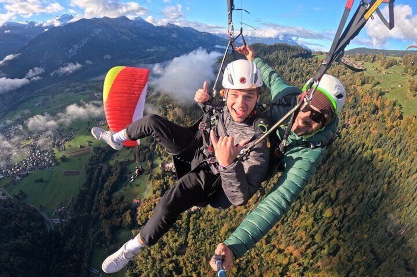 Happy Paragliding Passenger