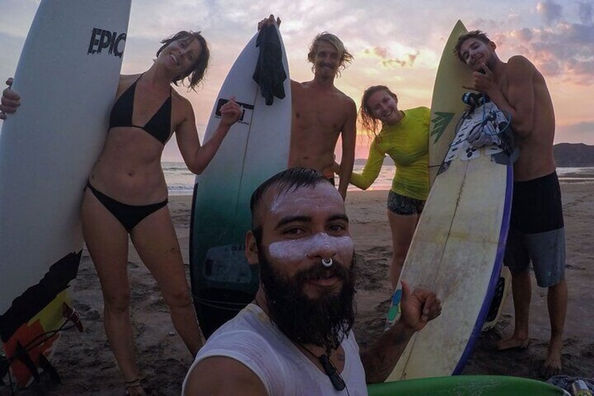 Surf Lessons For A Group At Sunset