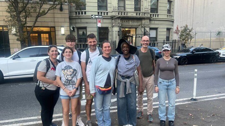 Our tour guide Sylvie with visitors in Harlem