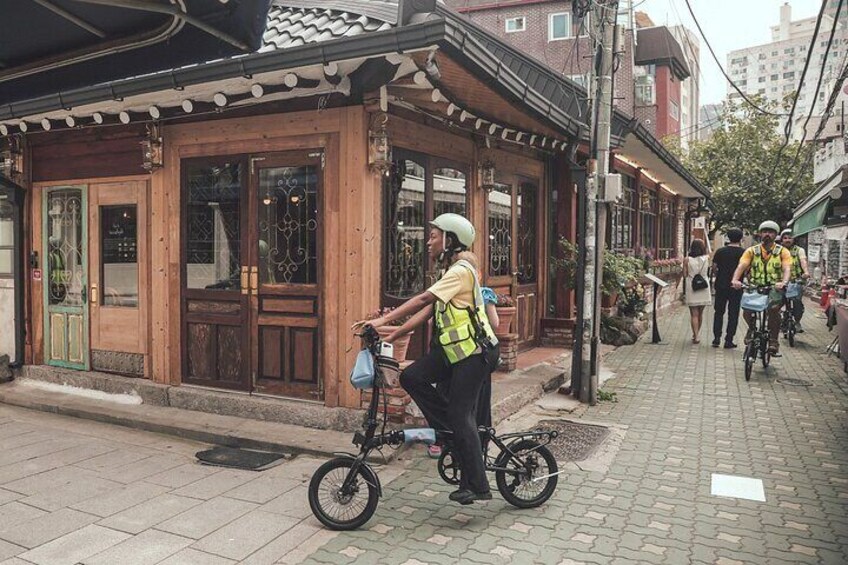 Take a ride through the charming alleys and explore them by bike.