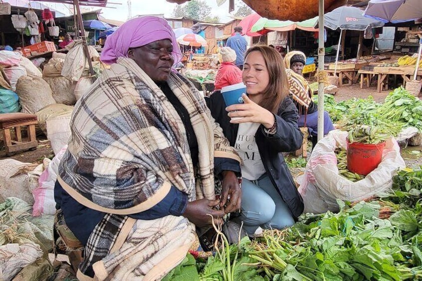 Interacting with friendly local vendors at the market 