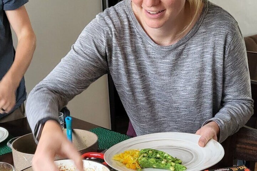 Guest enjoying a Kenyan Traditional Meal after the cooking class