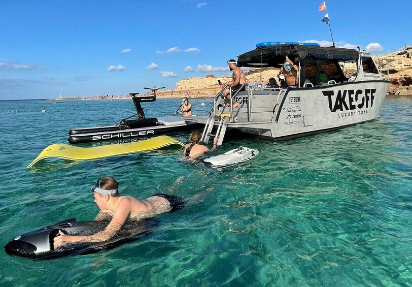 Picture 1 for Activity Ibiza: Beach and Cave Boat Tour with Luxury Water Toys