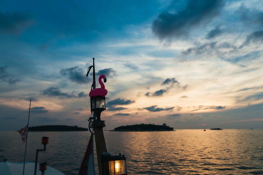 Picture 4 for Activity Rovinj: Sunset Cruise with Swim Stop, Drinks, and Fruits