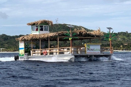 Tiki Boat Sunset Cruise in Roatan with Snorkeling and Dinner