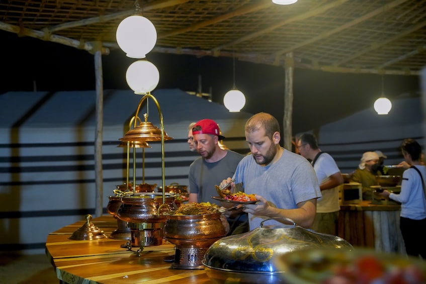 Premium Red Dunes & Camel Safari with BBQ at Al Khayma Camp