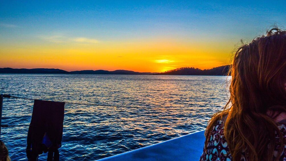 Show item 2 of 5. Sunset on the water in Queensland