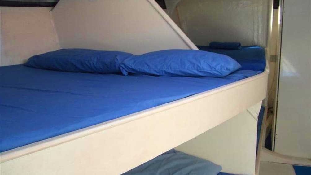 Show item 4 of 5. Bunk in a Sailboat