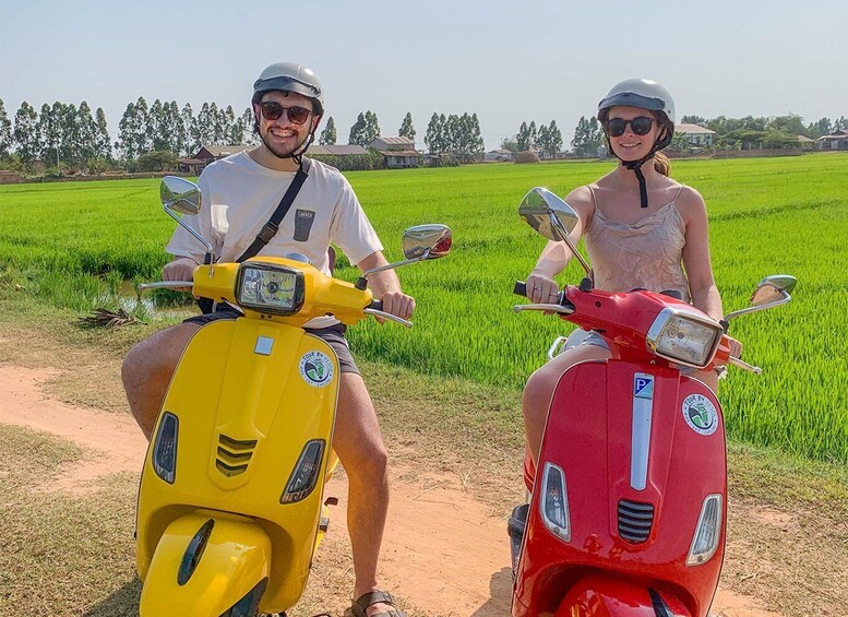 Picture 1 for Activity Siem Reap: Floating Village Sunset Boat Guided Vespa Tour