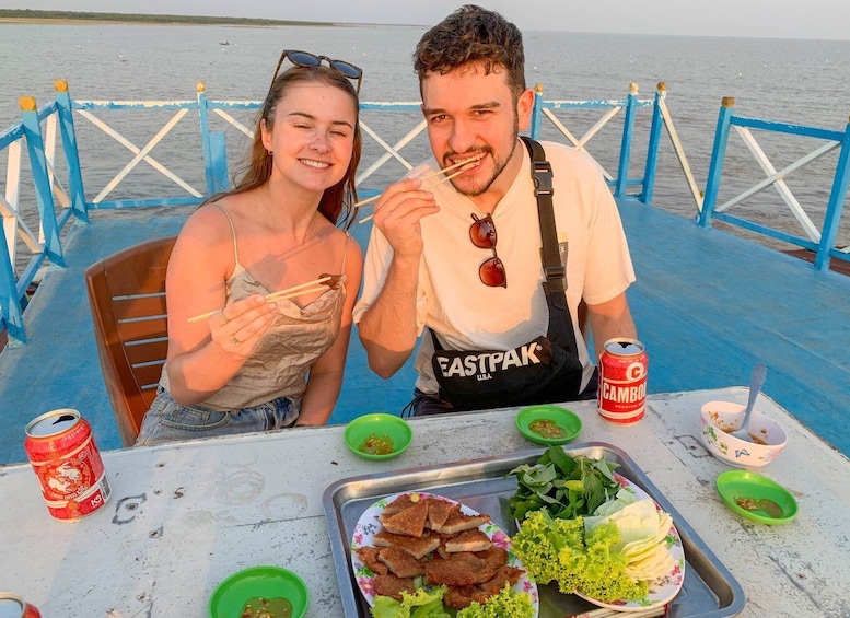 Picture 2 for Activity Siem Reap: Floating Village Sunset Boat Guided Vespa Tour