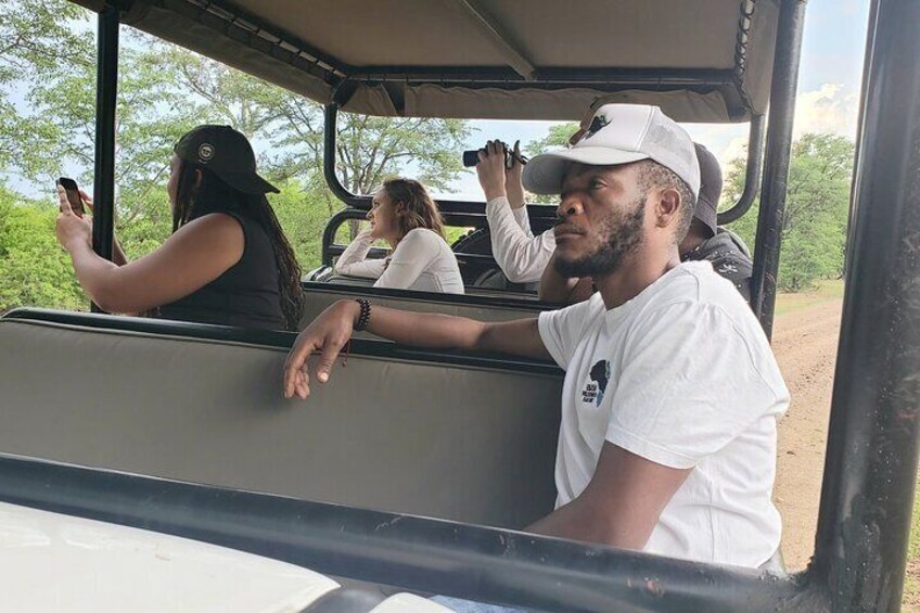 A Private white Rhino Game drive plus short Walk safari 