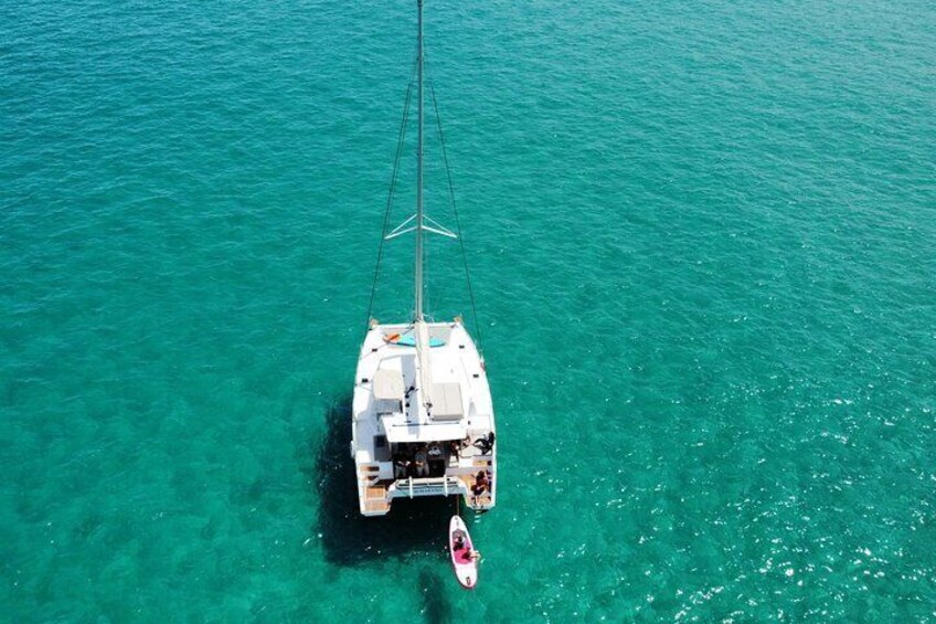 Guided Tour in Sailing Catamaran with Aperitif Included from Polignano