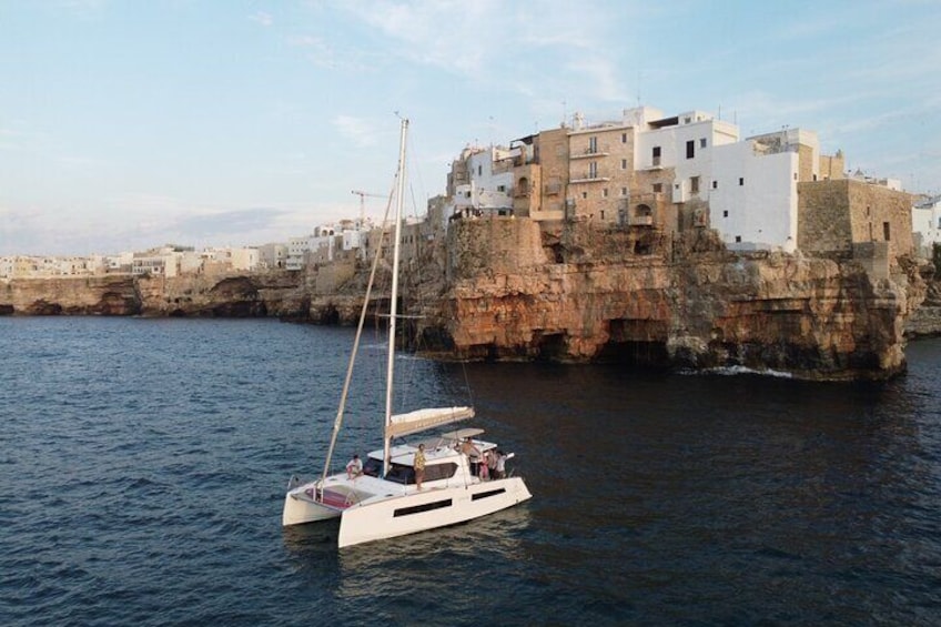 Guided Tour in Sailing Catamaran with Aperitif Included from Polignano