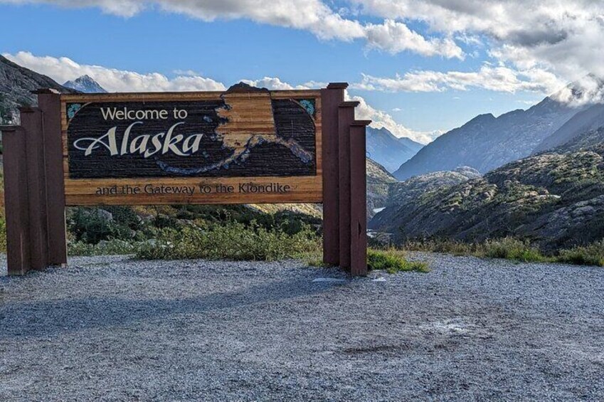 Welcome to Alaska sign at the White Pass is one of our main photo stops