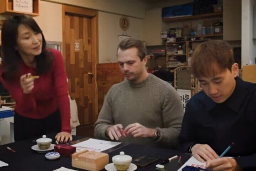 Carving a Korean Stone Seal with Jeongju in Insadong Seoul.