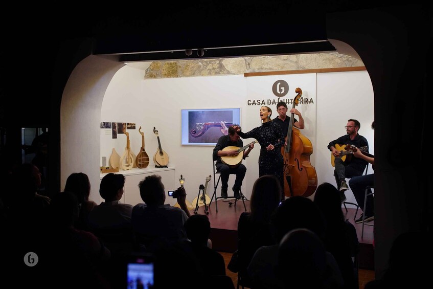 Picture 10 for Activity Porto: Fado Concert with Port Wine in Historical Music Store