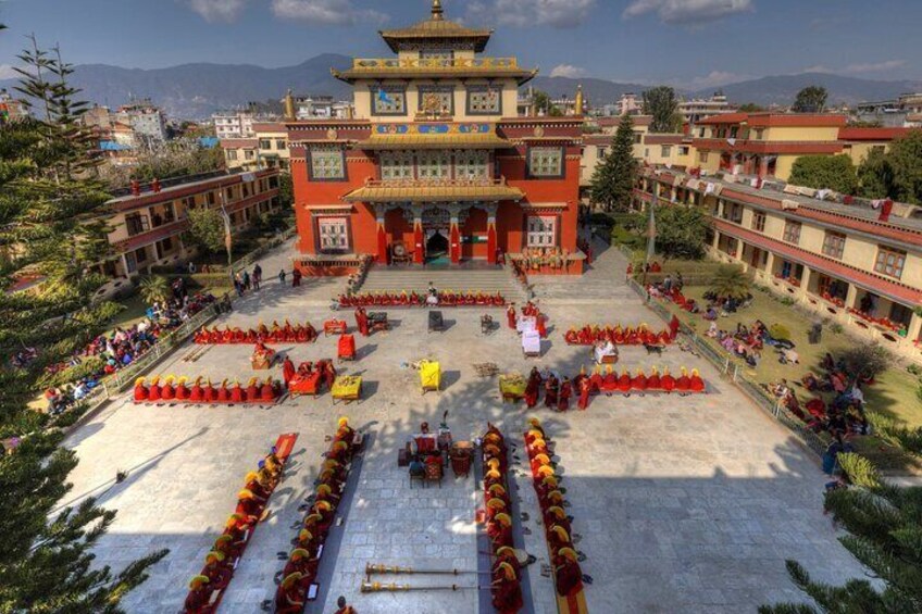 Occasional photo of monks performing rituals in a monastery near the stupa
