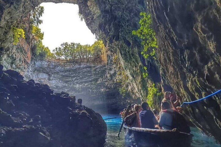 People on boat in Melissani Lake