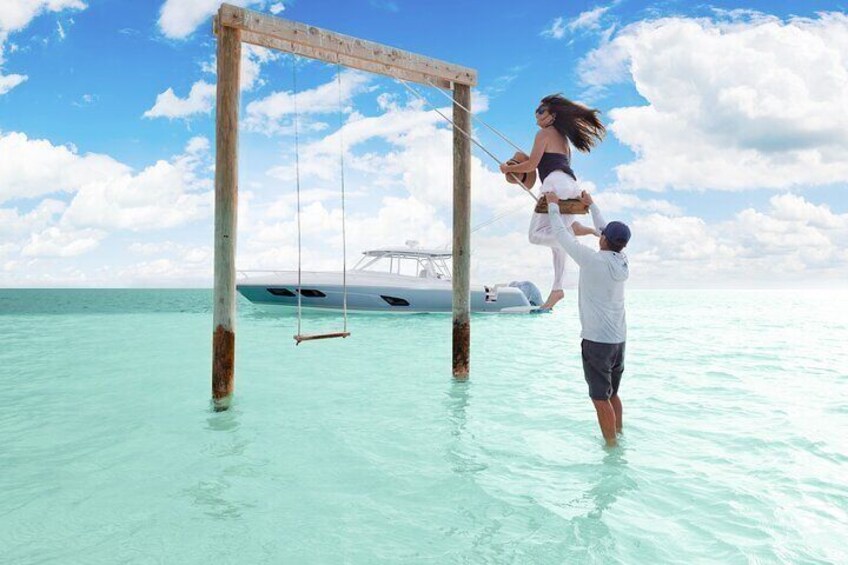 Experience the famous ocean swings of Eleuthera. Swing above the gentle waves, capturing the perfect photo with the azure backdrop.