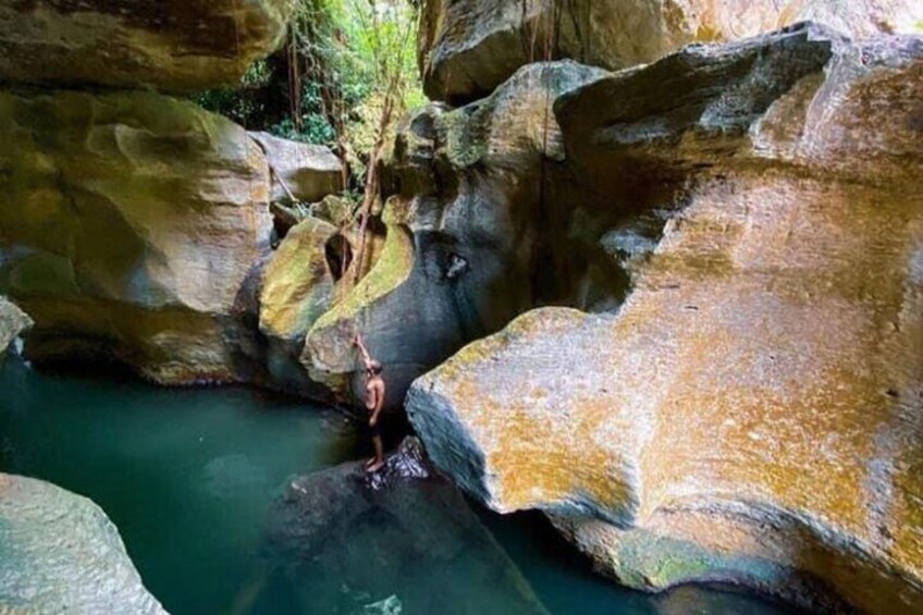 Rainforest Caves and Waterfalls Exploration with Transportation 