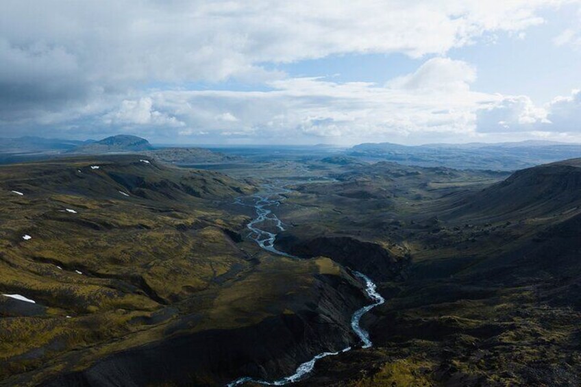 Crystal clear streams weave their way through the valleys.