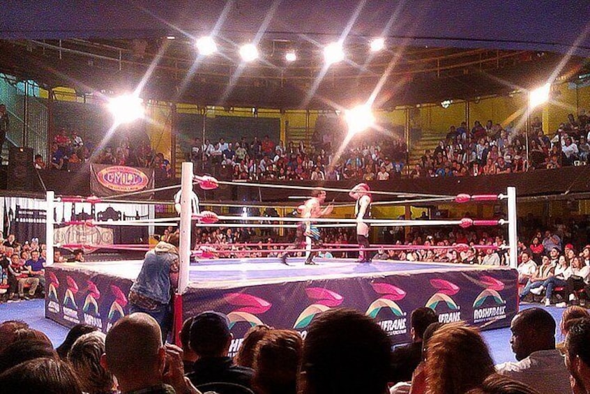 Snacks, beer and Lucha Libre experience with artist