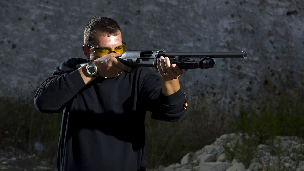Man with rifle at Machine Gun Vegas