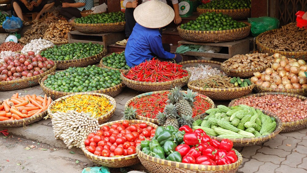 Baskets of produce in market in Hanoi