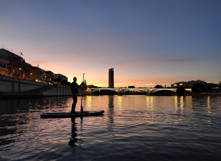 Picture 1 for Activity Seville: Sunset and Evening Paddle Boarding Tour