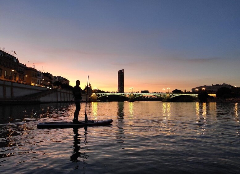 Picture 1 for Activity Seville: Sunset and Evening Paddle Boarding Tour