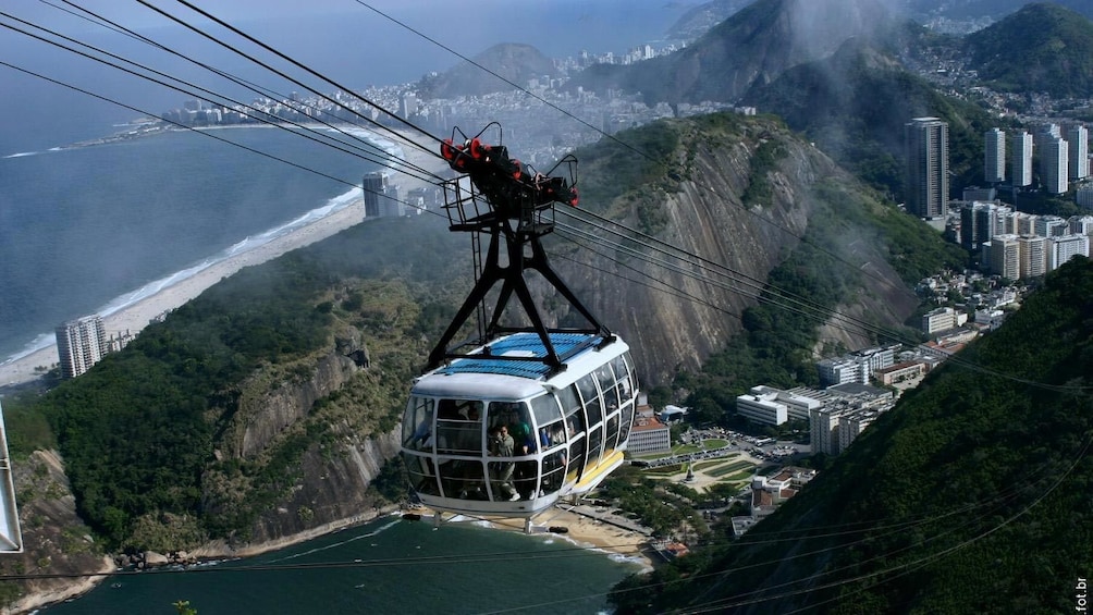 Aerial tram over the city heading towards Sugarloaf in Rio de Janeiro