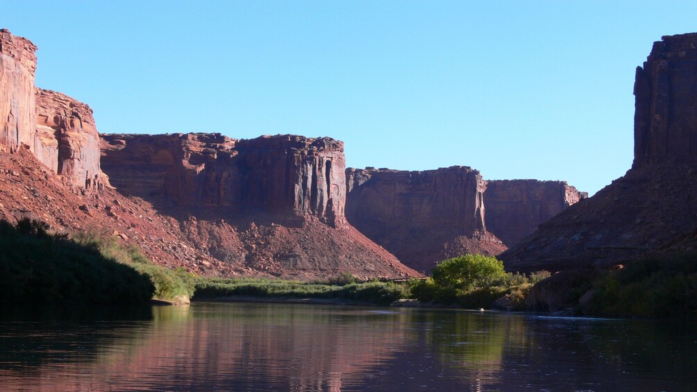 View in canyon of cliffs and river in Canyonlands