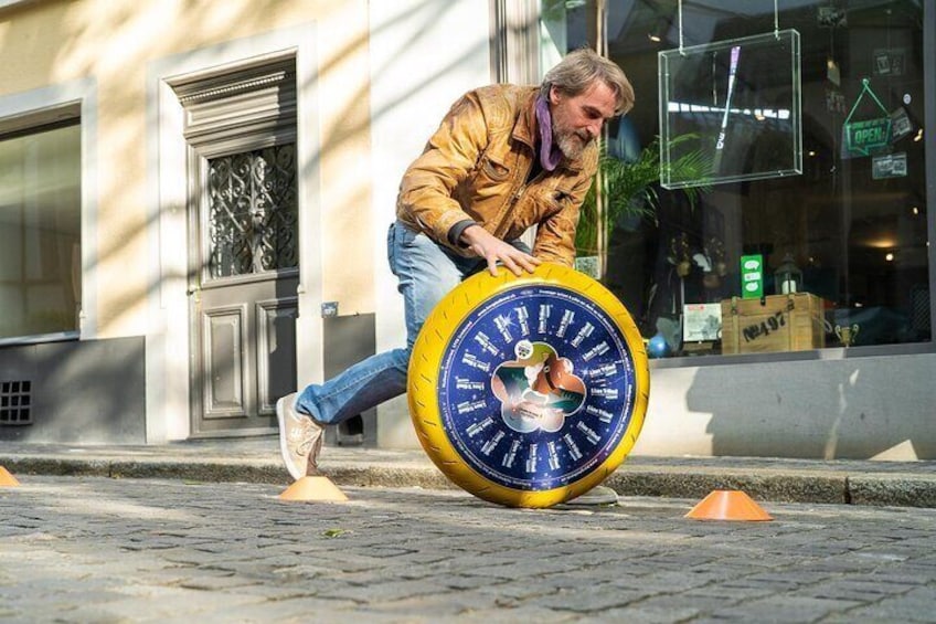 Cheese wheels roll through Zurich's old town