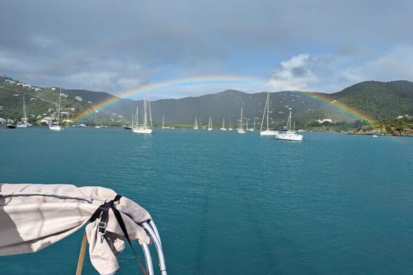 Heading back into port on Mandolin with a Double Rainbow for the view! 