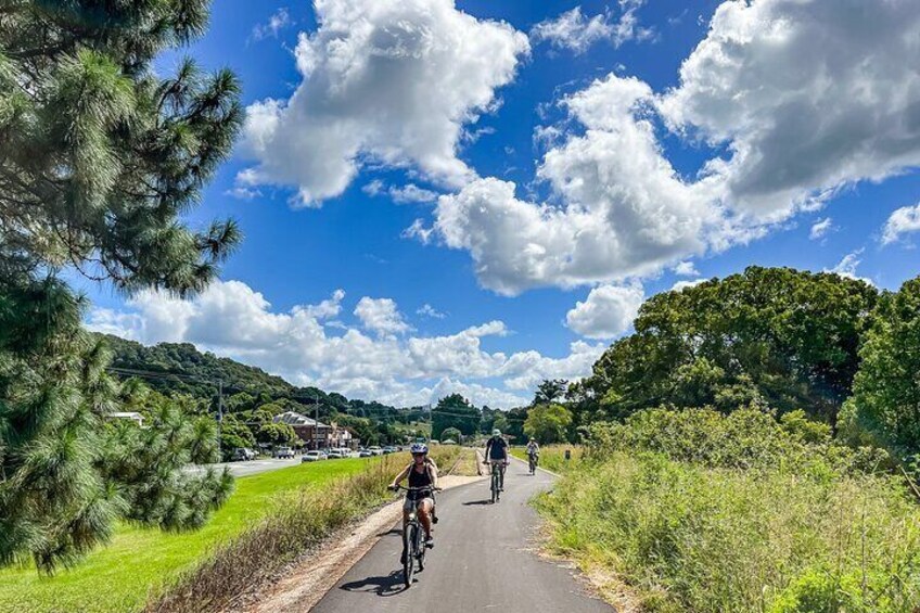 E Bike riders arriving back at Mooball on The Northern Rivers Rail Trail