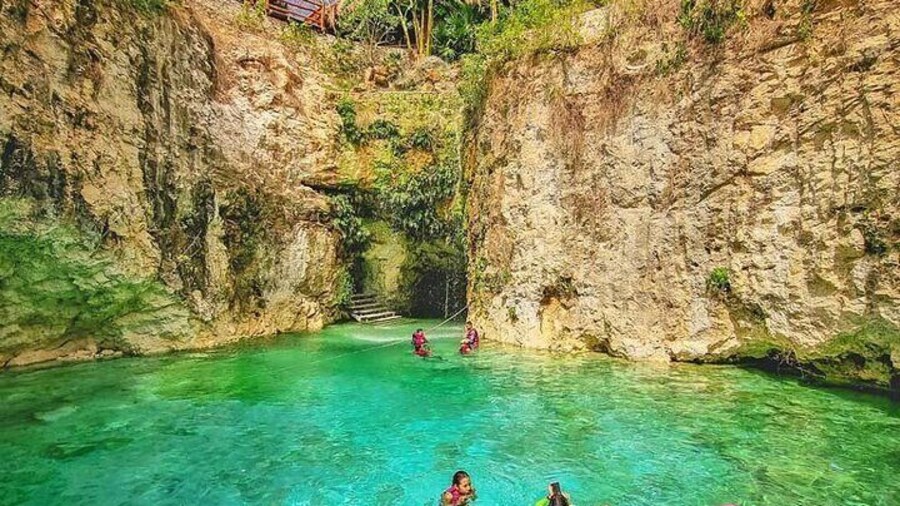 Amazing underground cenote with waterfall