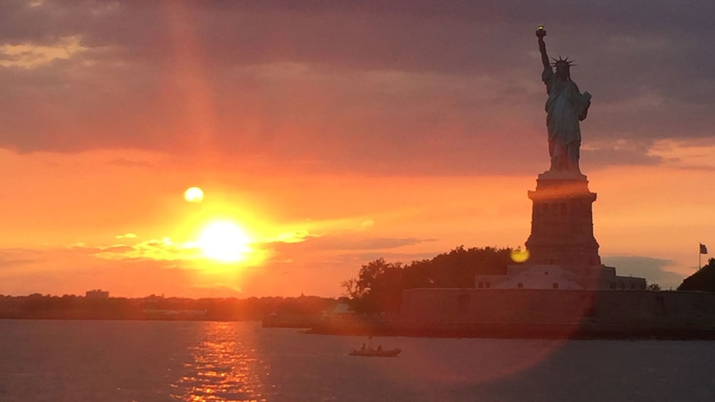 Show item 2 of 8. Statue of Liberty at sunset in New York