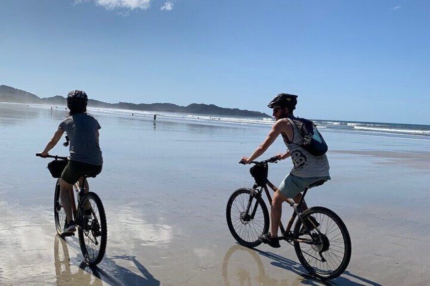 Low tide riding by the ocean.