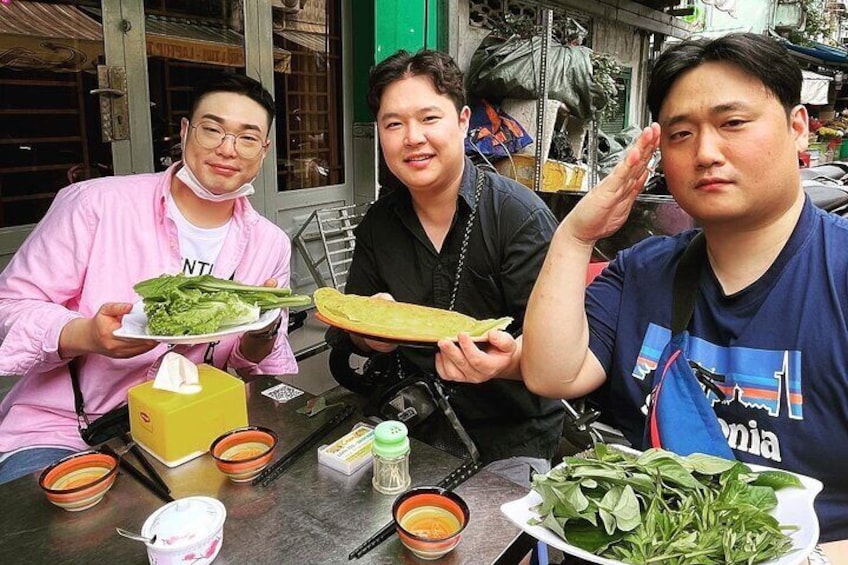Korean boys enjoying Bánh Khọt & Bánh Xèo