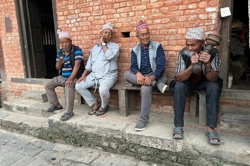 Old man enjoying hukka 